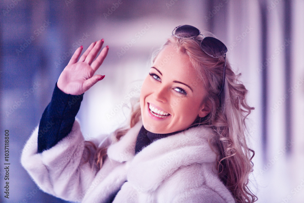 Smiling tourist waving hand in european city Smiling tourist waving hand in european city