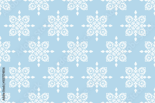 Elegant seamless damask floral pattern in white on light blue background, decorative ornamental design, ideal for wallpaper, textile, fabric, interior decor, wrapping paper, or digital prints