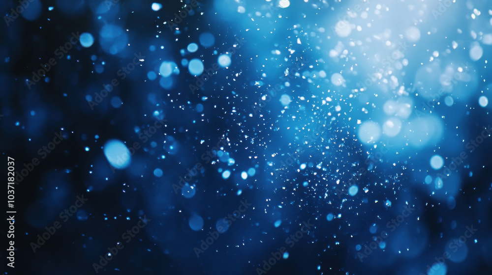 Fototapeta premium Blue bokeh lights creating a dreamy abstract background