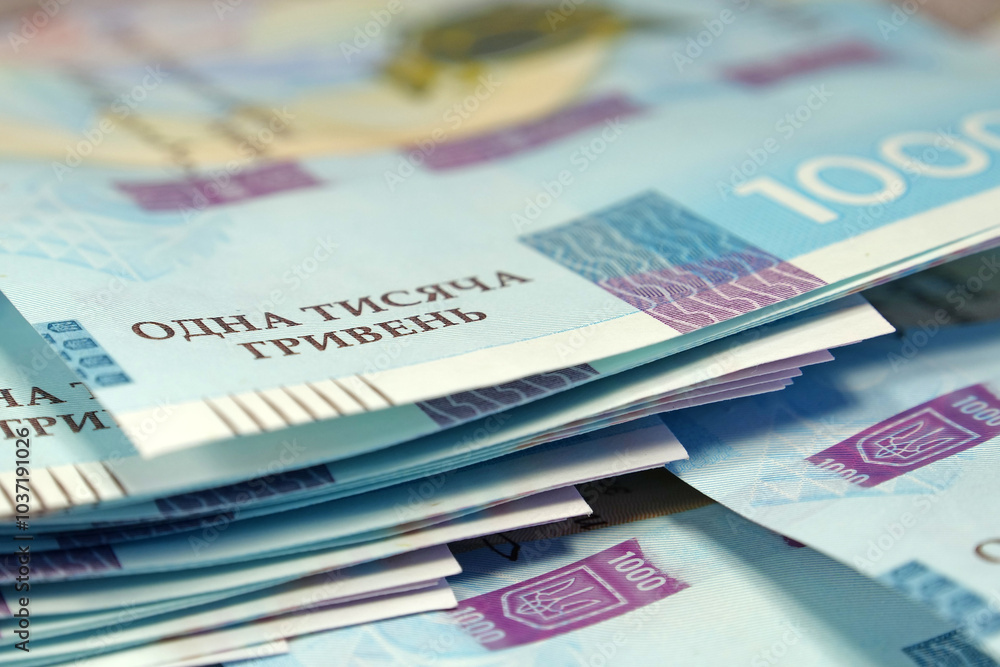 Banknotes 1000 Hryvnia. Real Ukrainian paper money of blue yellow color Banknotes 1000 Hryvnia. Real Ukrainian paper money of blue yellow color