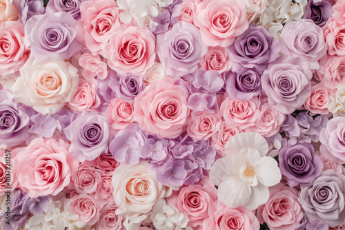 Vibrant floral arrangement with pink and purple roses in full bloom artistry