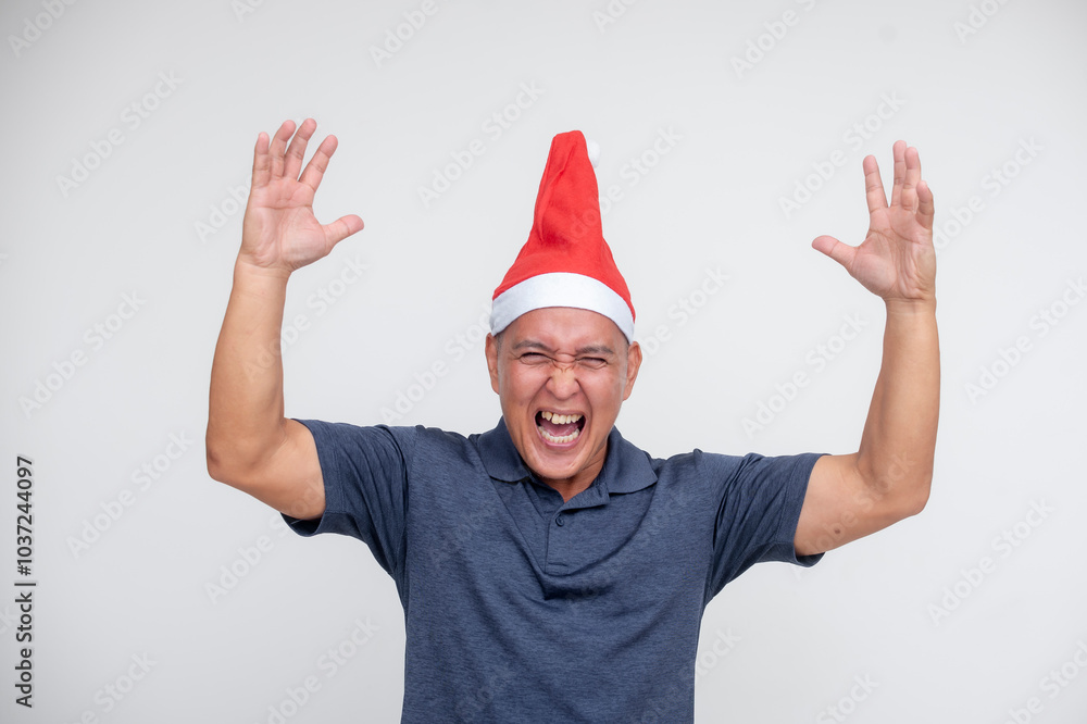 Cheerful middle aged man celebrating Christmas with a Santa hat Cheerful middle aged man celebrating Christmas with a Santa hat