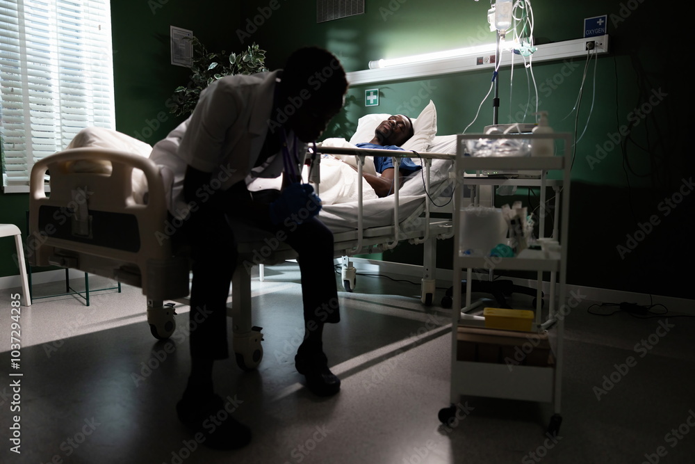 Fototapeta premium Empathetic healthcare provider sits beside an unconscious patient, ensuring their comfort and well-being.