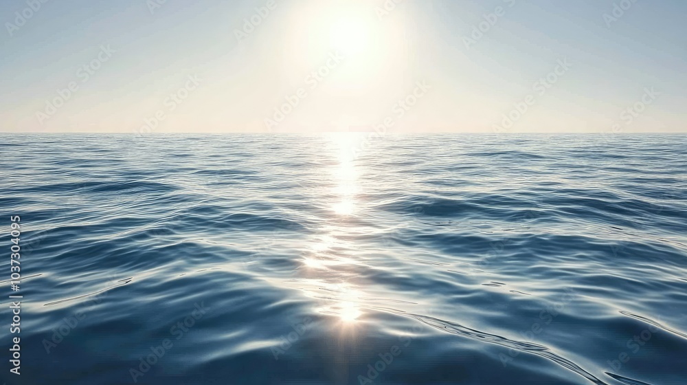 A reflective ocean surface with calm waves gently moving across a sunlit horizon, under a clear sky. A reflective ocean surface with calm waves gently moving across a sunlit horizon, under a clear sky.