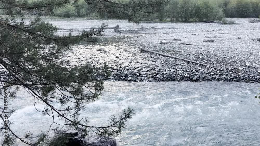 Mountain river in the fall forest. Concept of outdoor walking, time in nature, clean air. Mountain river in the fall forest. Concept of outdoor walking, time in nature, clean air.