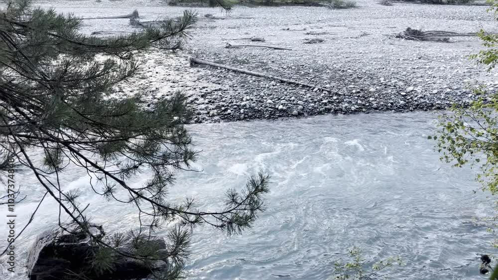 Mountain river in the fall forest. Concept of outdoor walking, time in nature, clean air. Mountain river in the fall forest. Concept of outdoor walking, time in nature, clean air.