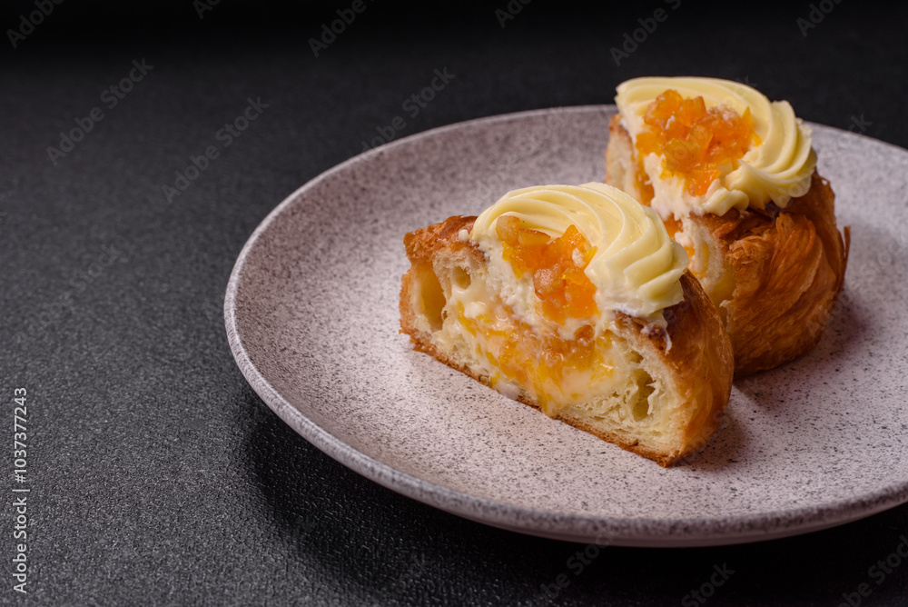 Sweet dessert danish with raisins, cream and pear filling Sweet dessert danish with raisins, cream and pear filling
