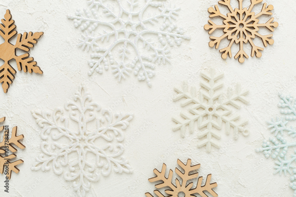 Beautiful snowflake on concrete background, top view Beautiful snowflake on concrete background, top view