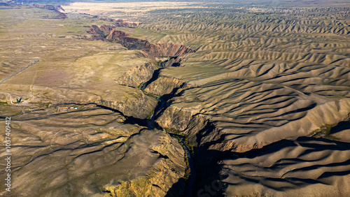 Black canyon in the Almaty region of Kazakhstan, during golden hour.