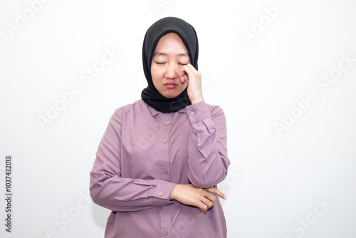 Asian, young Indonesian woman dizzy, girl headache or migraine suffering at home, holding head with hands, brain health problem Isolated on white background