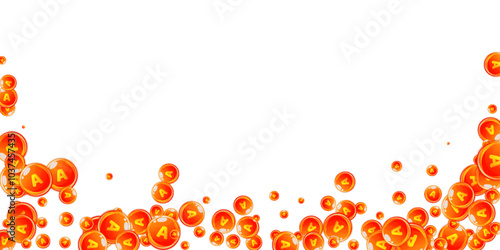 Vitamin A round capsules scattered randomly.