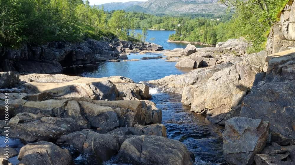 low water level in dammed river stream from mountain source in northern norway low water level in dammed river stream from mountain source in northern norway