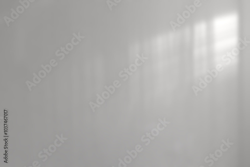 Light and shadow on an abstract gray background.