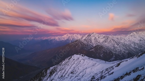 A panoramic view of a snowy mountain range under a dramatic sunset sky, Mountain scenery scene, Majestic and awe-inspiring style
