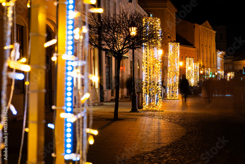 Festive Christmas lights at night on a city street in Hungary photo