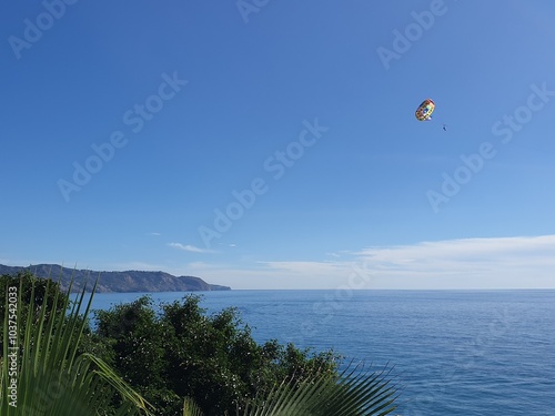 Paraglider over Nerja at the spanish Costa del Sol photo