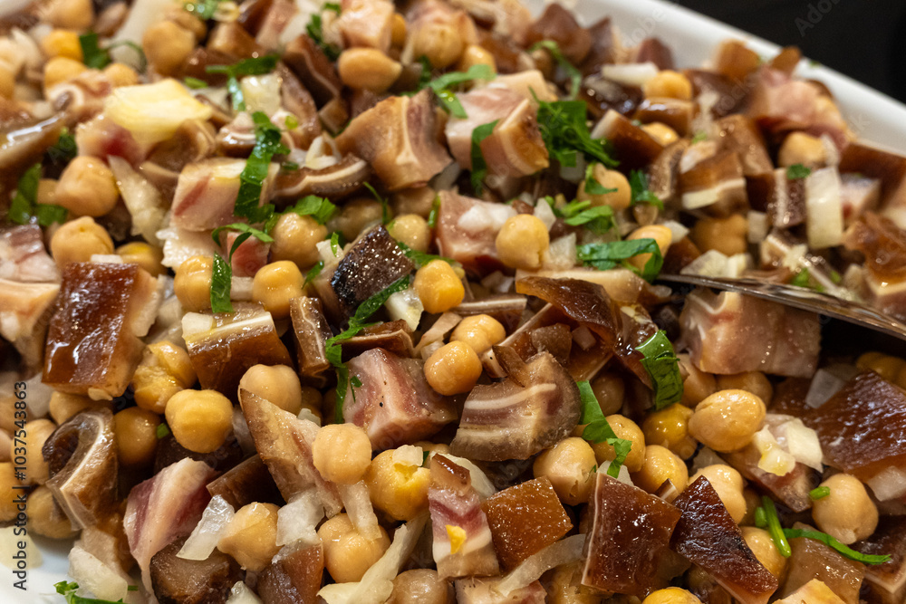 meal made with pig's ear, chickpeas, onion and lettuce, north Portugal meal made with pig's ear, chickpeas, onion and lettuce, north Portugal