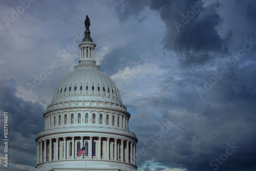 Close up of the US capitol building dome with gathering storm clouds.  Concept of political or social turmoil.
