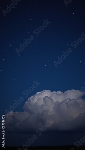 Tranquil starry night over glowing clouds photo