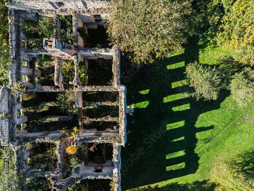 Wlodowice, Poland ruined palace. Aerial drone view of the palace in Wlodowice – ruined palace, located in Wlodowice. Abandoned palace seen from a drone. Abandoned palace without a roof. photo