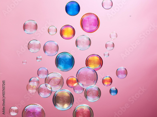 colorful soap banks on a pink background