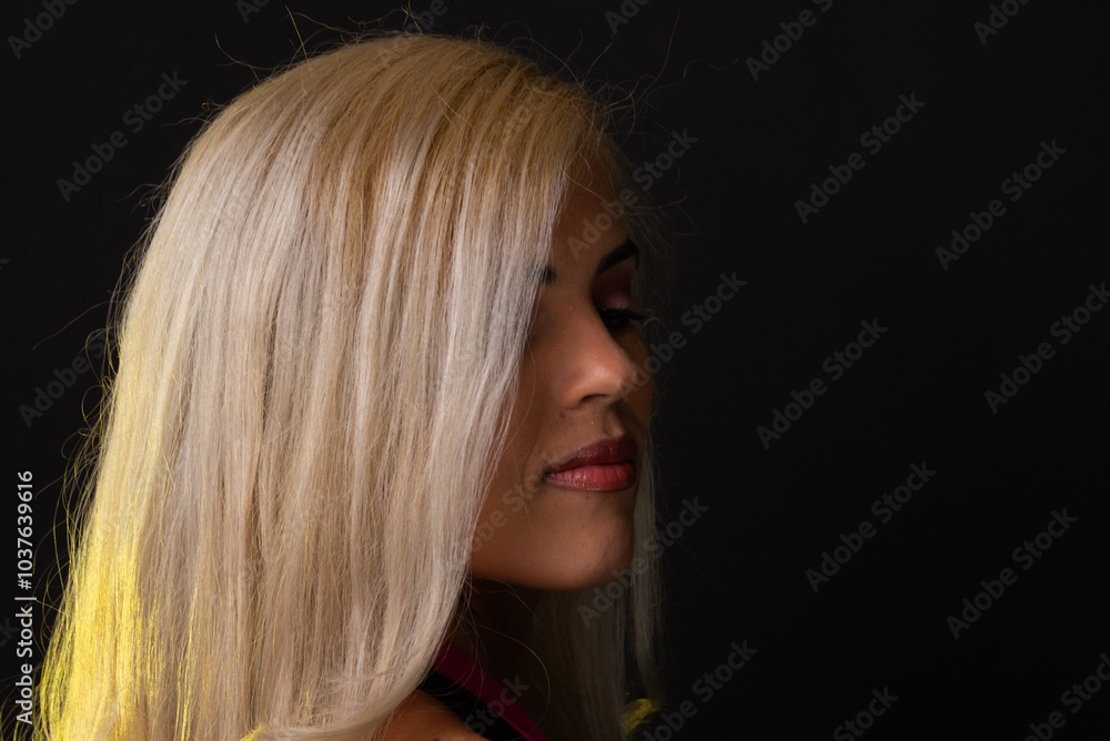 Naklejka premium Caucasian woman with blond hair in a red dress posing for a photo in a studio in the city of Salvador, Bahia.