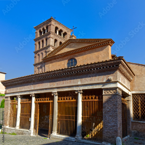Obraz na płótnie Old place of worship and a watch tower behind it, Rome, Italy w salonie
