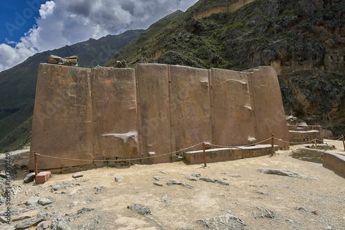 Standing in awe at the Temple of the Sun in Ollantaytambo, where the stones whisper stories of Inca ingenuity and celestial alignment photo