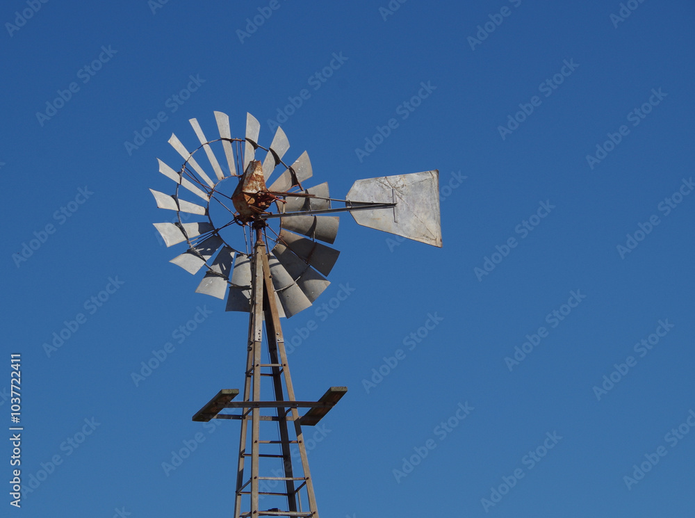 old windmill against sky background old windmill against sky background