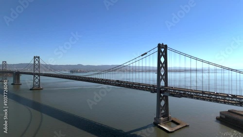 Aerial San Francisco Bay Bridge in the Blue Sky Zoom In 