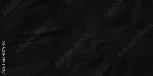 Crumpled texture of dark black wrinkle chaotic paper. old crumple black old paper sheet abstract shape recycling wrapping background space for texture.