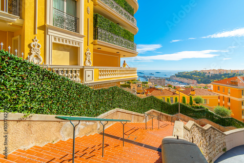 Luxury residential apartments, condos and townhomes in the hills of Monte Carlo, Monaco, overlooking the Rock, Mediterranean sea and marina, along the French Riviera Cote d'Azur. photo