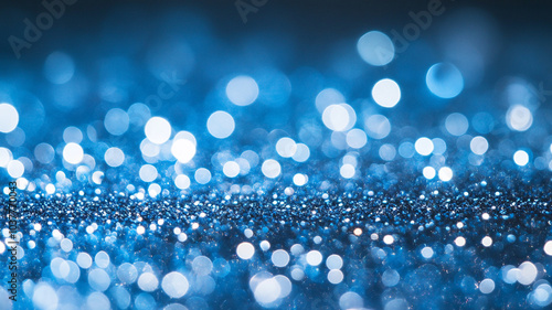 Shimmering blue glitter spread across a festive surface for a joyful Christmas celebration