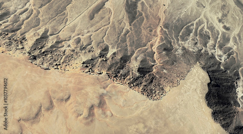 The landscape of the sandy desert in Qatar from a bird's eye view