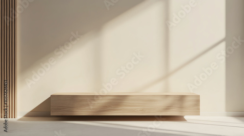 Minimalist wooden bench in bright sunlight casting shadows across a clean, empty room with beige walls and modern architectural design.