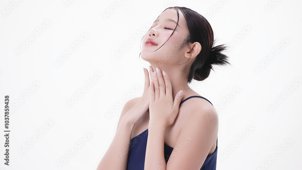 Fototapeta premium Beautiful young Asian woman with K beauty style makeup and perfect skin on isolated white background. Facial and skin care concept for commercial advertising.