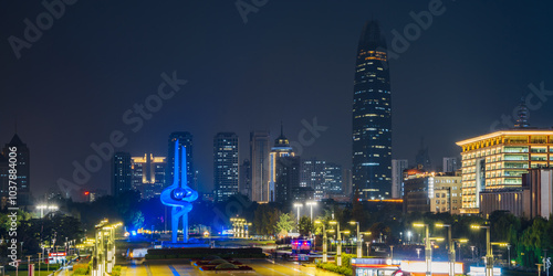 Night view of Quancheng Square and Greenland Center in Jinan, Shandong, China photo