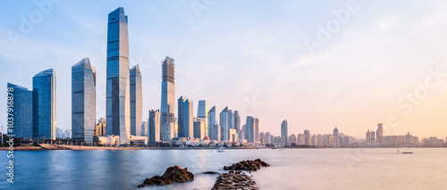 Fototapeta Naklejka Na Ścianę i Meble -  Morning Scenery of the Fushan Bay Coastal Architecture Complex in Qingdao, Shandong, China
