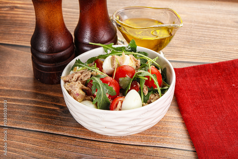 Salad with tuna, tomato, quail egg and arugula Salad with tuna, tomato, quail egg and arugula