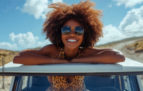 Enjoying a sunny day outdoors with friends on a vehicle in a desert landscape