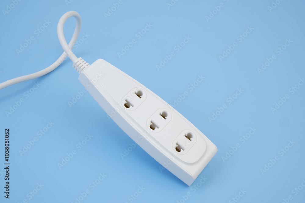 Power supply on blue background. Energy consumption concept. Copy space for text. Power supply on blue background. Energy consumption concept. Copy space for text.