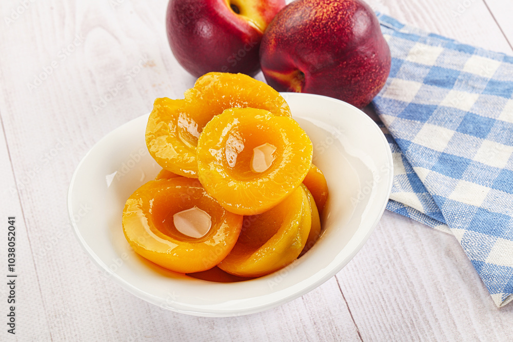 Canned peaches with sweet syrope Canned peaches with sweet syrope