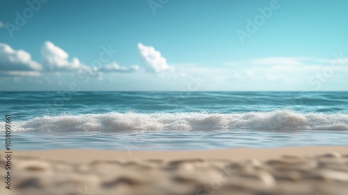 Gentle waves lap against sandy shore under bright blue sky with fluffy clouds...