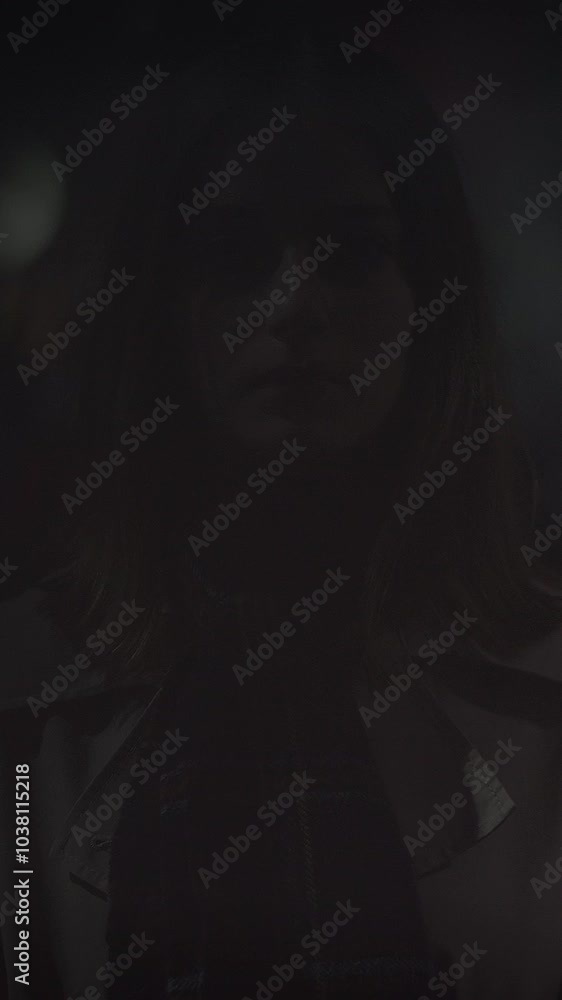 An Enigmatic and Mysterious Portrait Captured in a Low Light Setting, Full of Intrigue