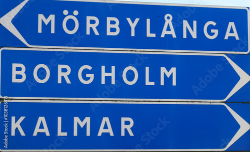 Obraz na płótnie Sign post with directional road signs to the Swedish towns Morbylanga, Borgholm and Kalmar. w salonie