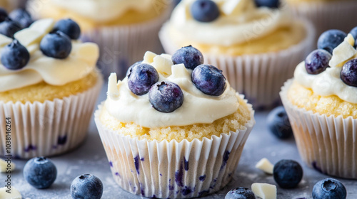 Blueberry cheesecake cupcakes with white chocolate frosting, dessert. AI generative. photo