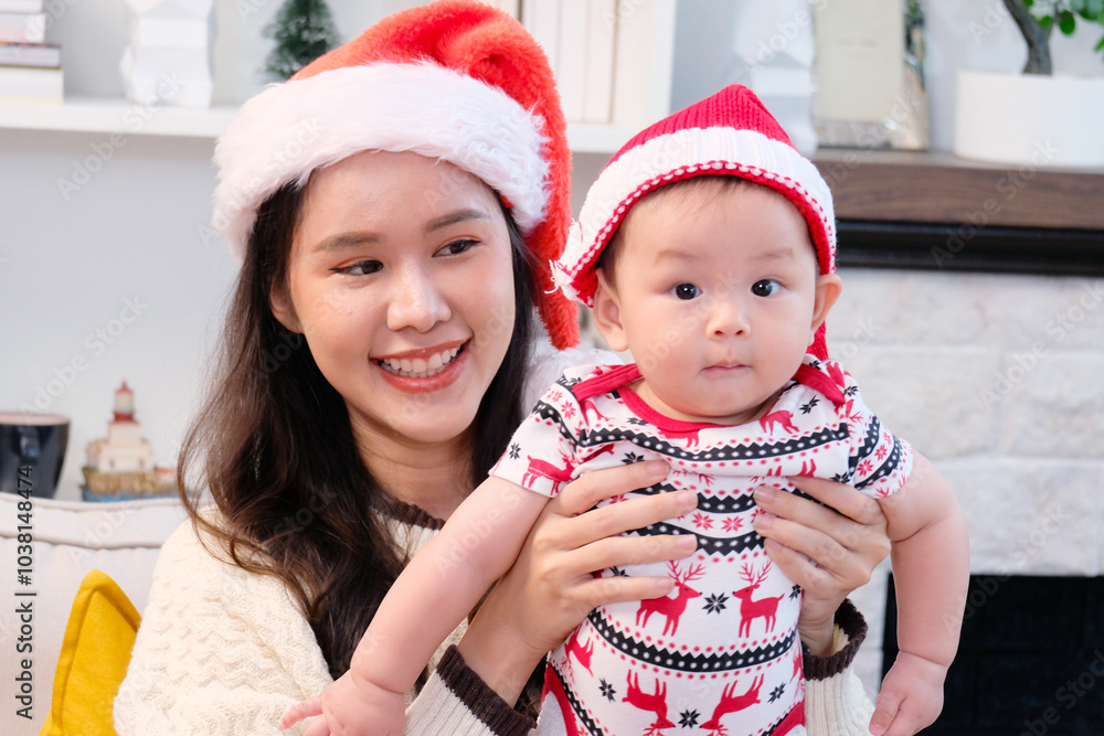 Young woman and young child celebrating Christmas. Young woman and young child celebrating Christmas.