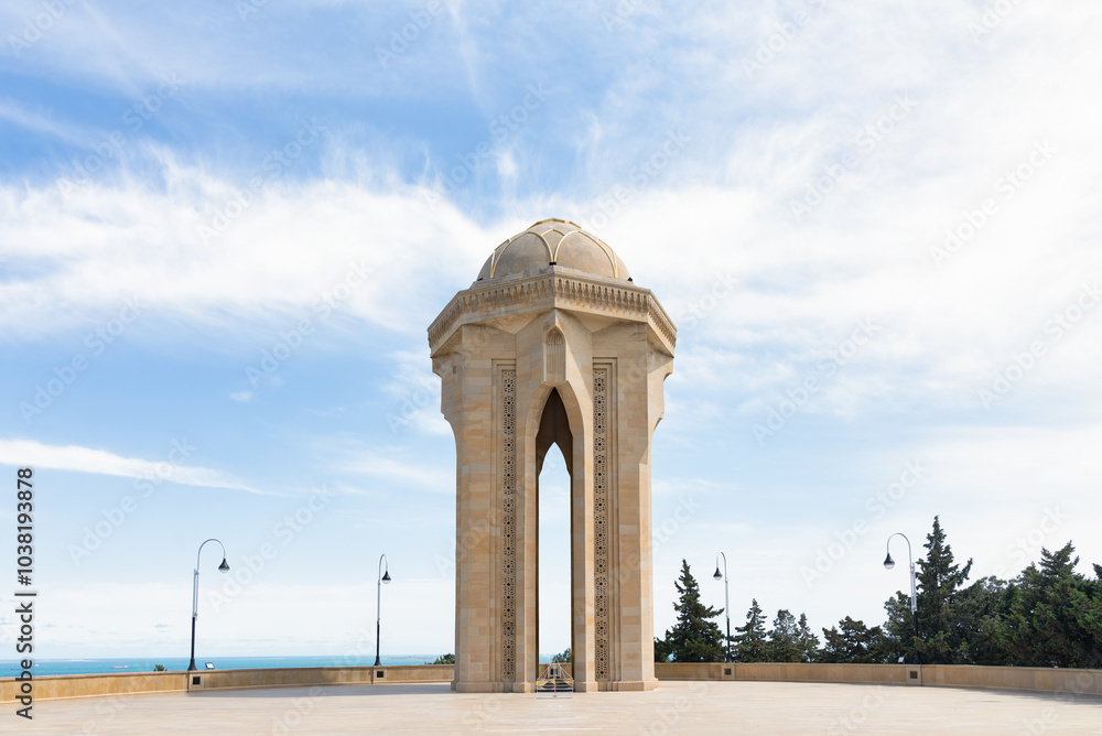 Φωτογραφία The Eternal Flame Monument in Baku, Azerbaijan stands majestically against the v