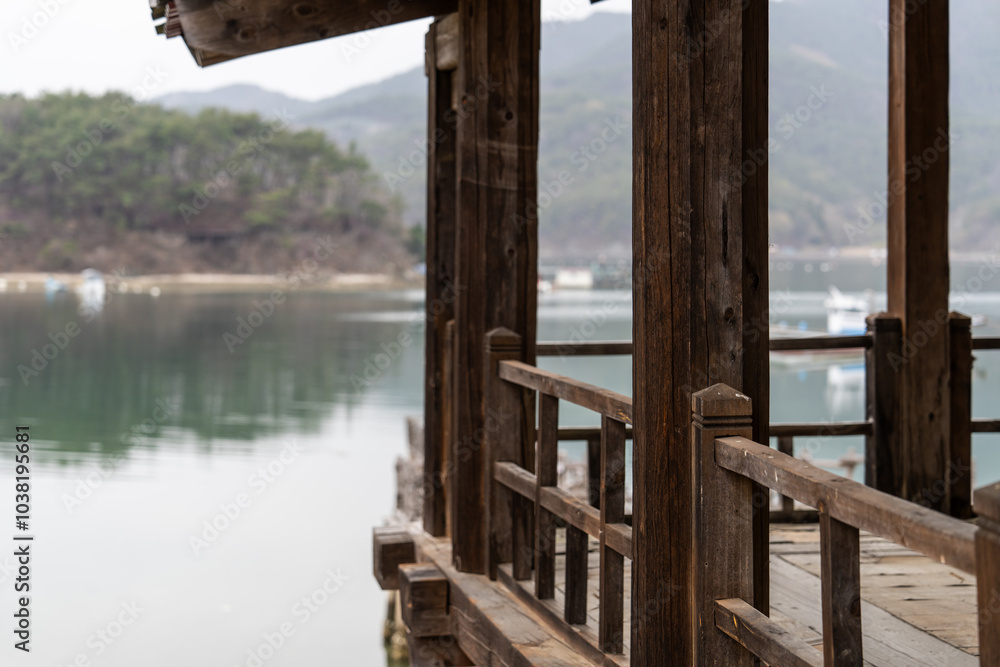 balcony in the old wooden building at the lakeside balcony in the old wooden building at the lakeside