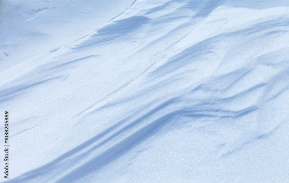Natural winter texture of snow white crust on frozen Baikal Lake in cold day. Abstract white and blue snowy textured background in form of frozen waves. Blank, copy space, mock up, flat lay, top view Natural winter texture of snow white crust on frozen Baikal Lake in cold day. Abstract white and blue snowy textured background in form of frozen waves. Blank, copy space, mock up, flat lay, top view